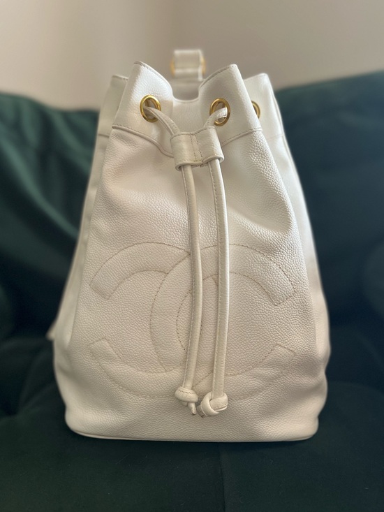CHANEL Handbags - Vintage CHANEL Timeless Drawstring Sling Crossbody Backpack Caviar Medium White